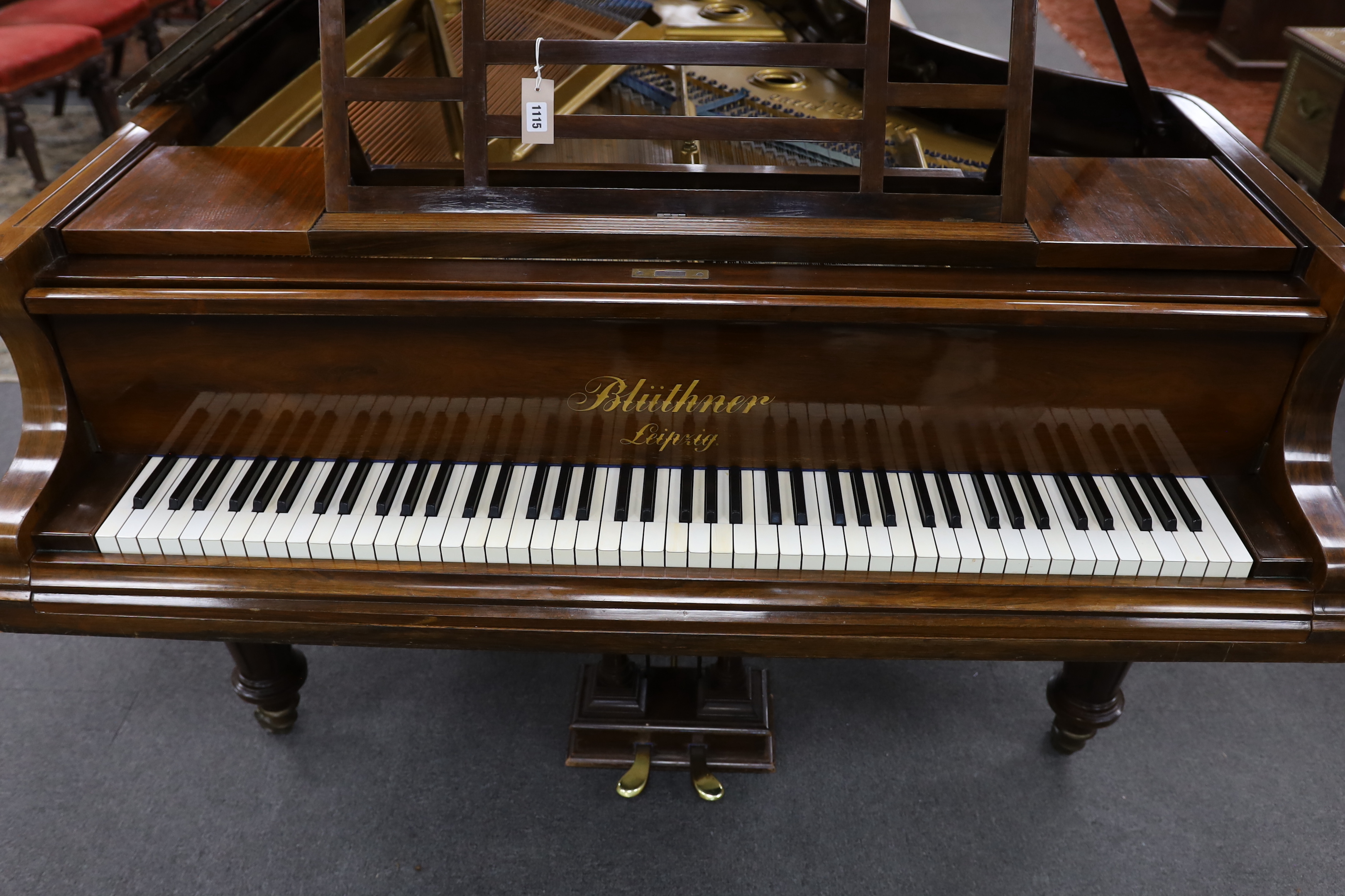 An early 20th century Blüthner rosewood and simulated rosewood Alquot Patent grand piano, Serial No. 72354, width 146cm, length 188cm